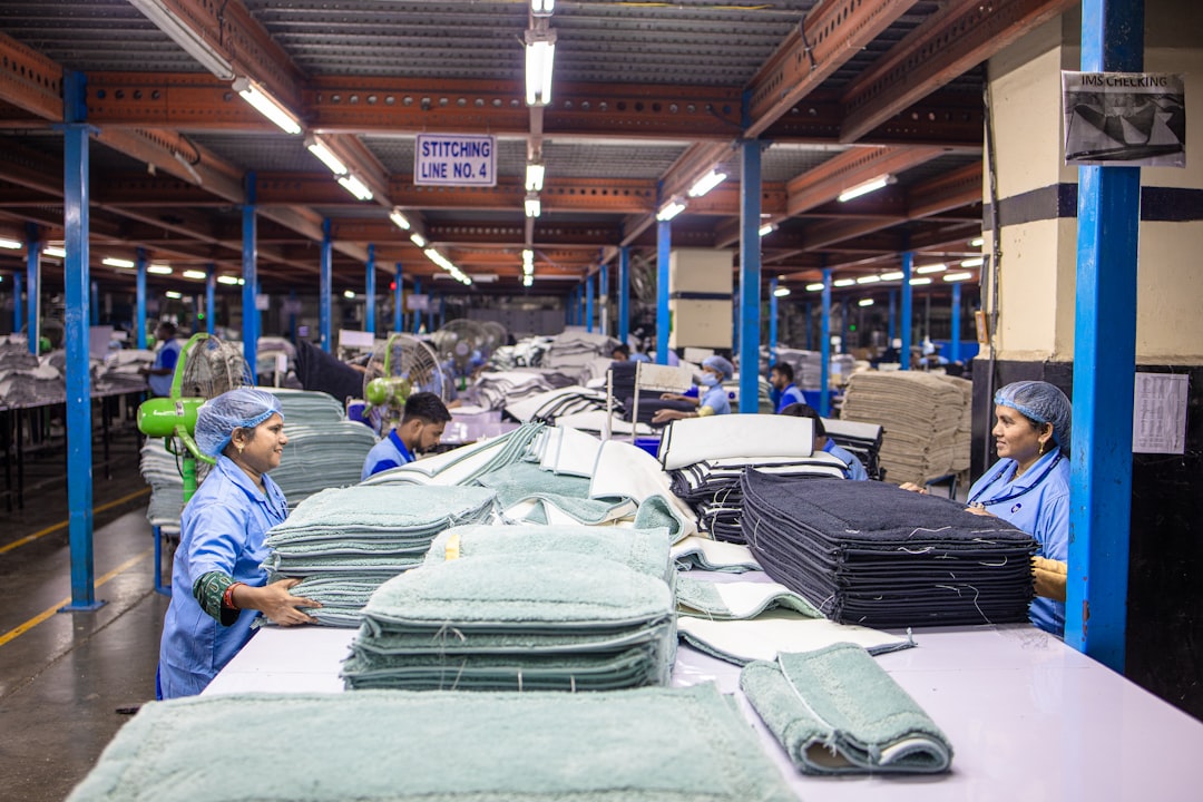 textile-workers-are-sorting-fabric-in-a-factory-kuyumg6hkwk